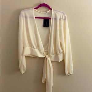 Cream wrap crop top with long sleeves